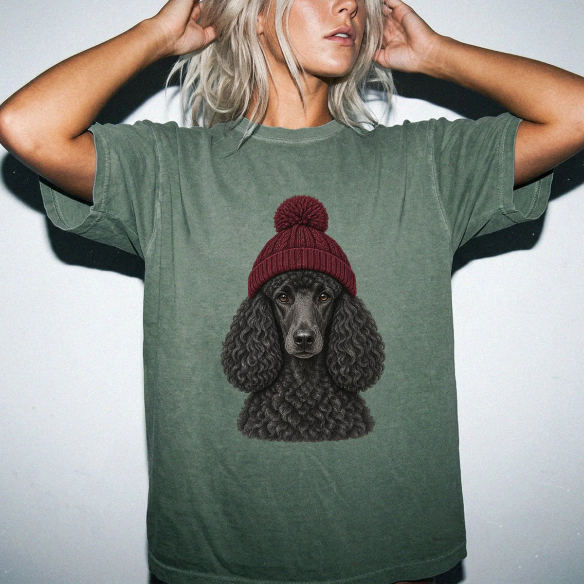 Woman wearing a Moss Poodle hipster T-shirt with a maroon-beanie dog portrait
