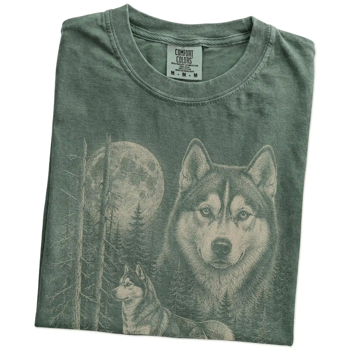 Folded Moss Husky Moonlit Forest T-Shirt showing the graphic