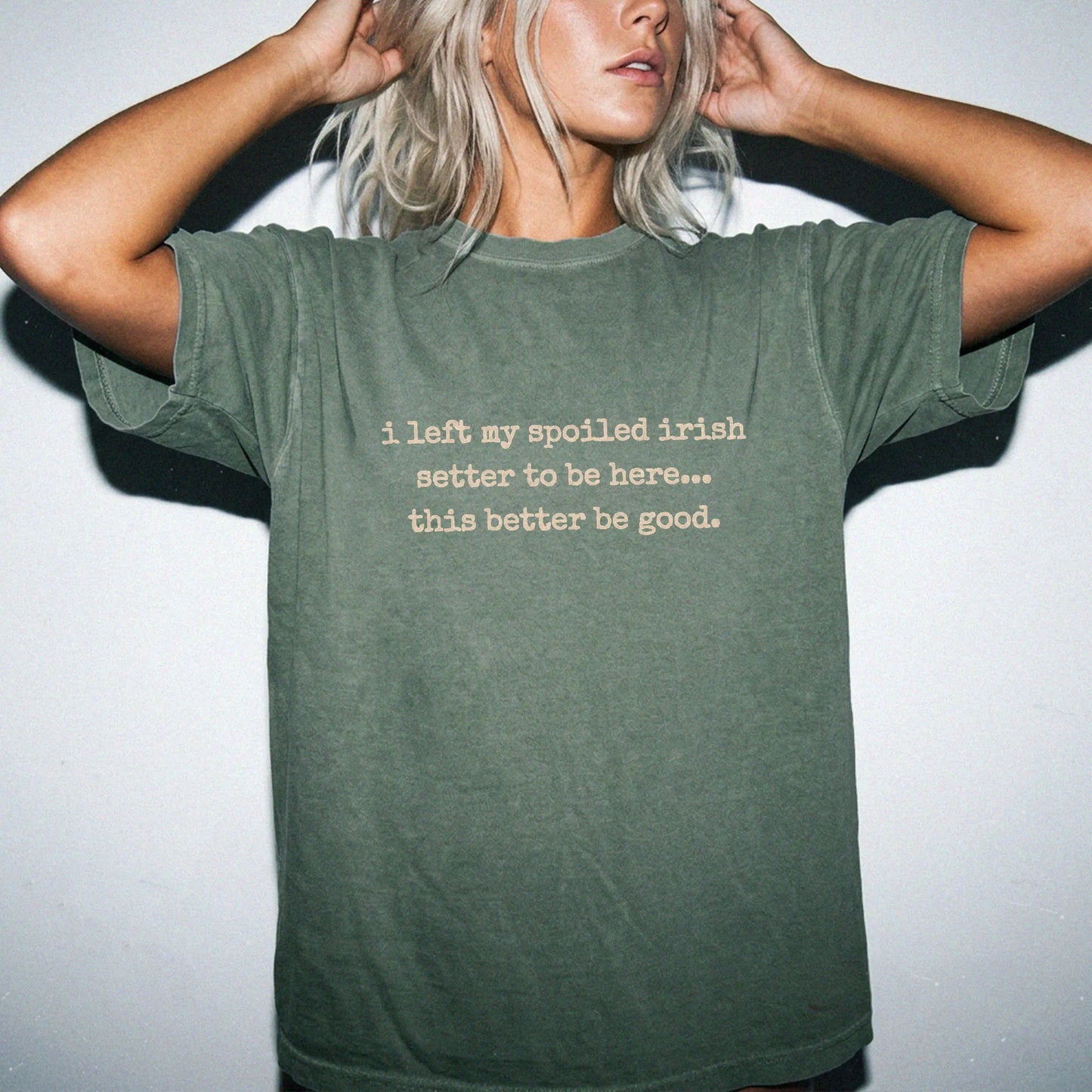 Model wearing a Moss Comfort Colors® T-shirt featuring the “I Left My Spoiled Irish Setter Home” saying