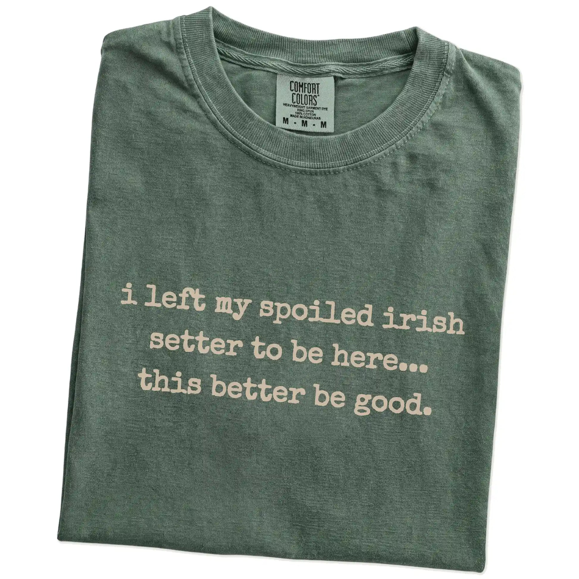 Folded Moss Comfort Colors® T-shirt showing the “I Left My Spoiled Irish Setter Home” saying