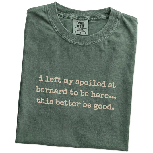 Folded Moss Comfort Colors® T-shirt showing the “I Left My Spoiled Saint Bernard Home” saying