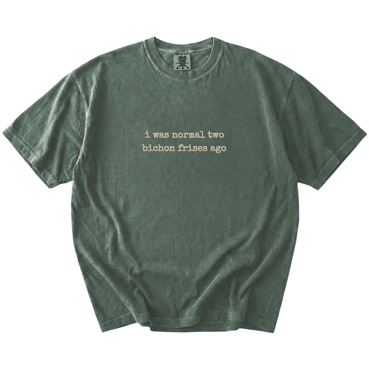 I Was Normal Two Bichon Frises Ago lettering on a Moss Comfort Colors® T-shirt