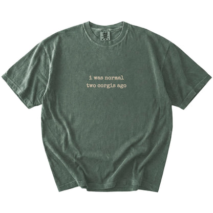 I Was Normal Two Corgis Ago lettering on a Moss Comfort Colors® T-shirt