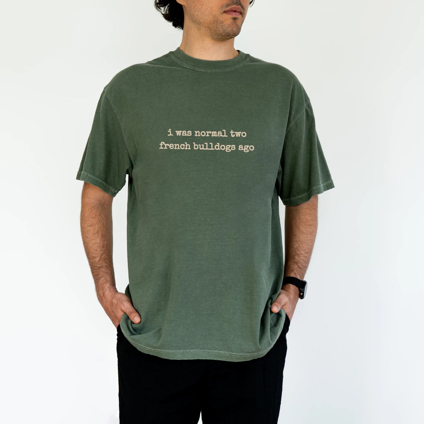 Model wearing a Moss Comfort Colors® T-shirt with i was normal two french bulldogs ago lettering