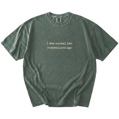 I Was Normal Two Rottweilers Ago lettering on a Moss Comfort Colors® T-shirt