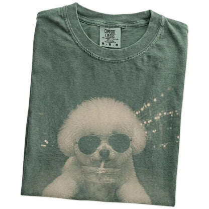 Folded Moss Comfort Colors® T-shirt showing Bichon Frise with iced coffee in a retro grunge design