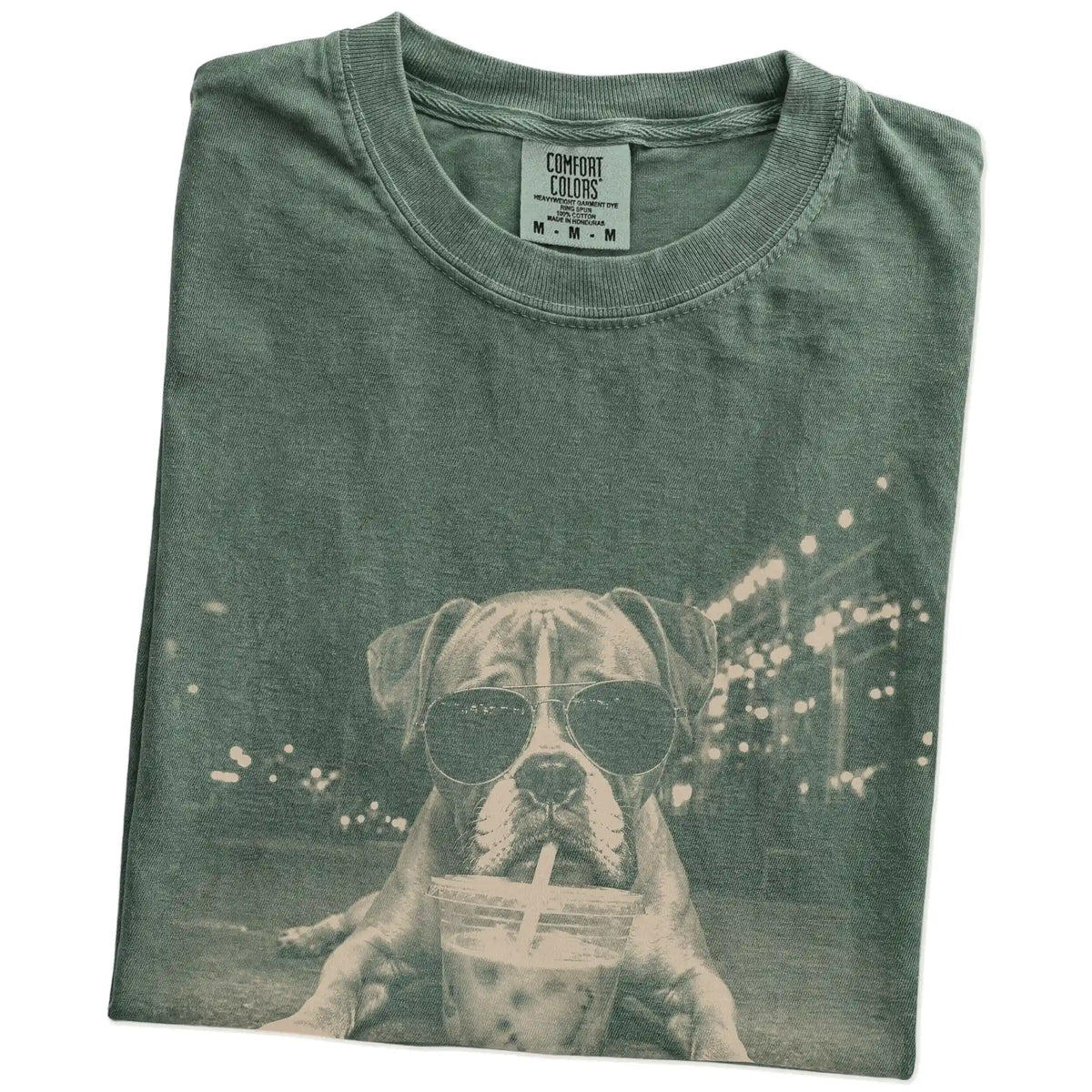 Folded Moss Comfort Colors® T-shirt showing Boxer with iced coffee in a retro grunge design