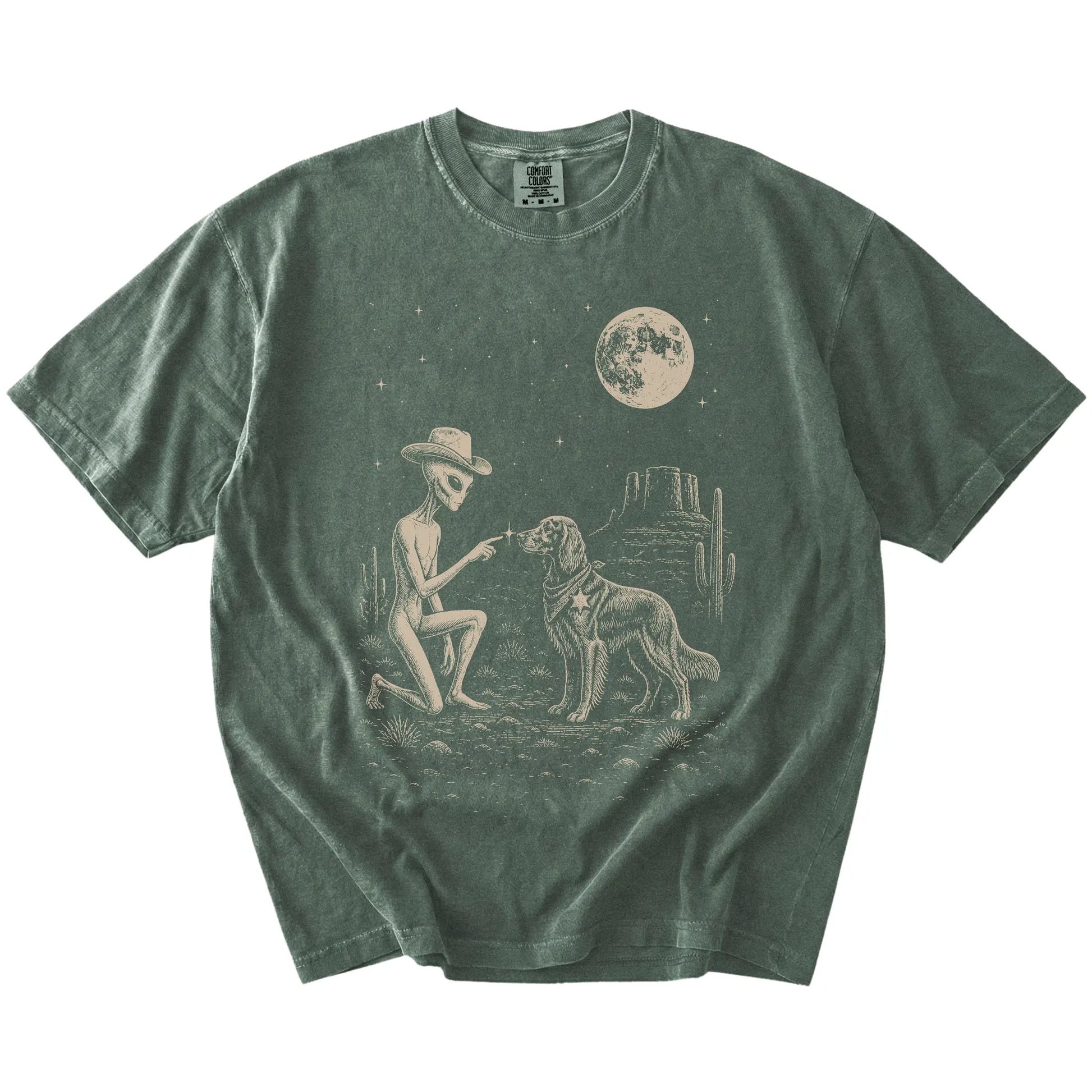 Cowboy alien fist-bumping a Irish Setter beneath the moon on a Moss Comfort Colors® T-shirt
