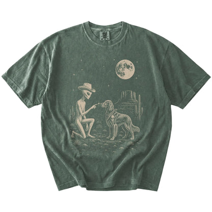 Cowboy alien fist-bumping a Irish Setter beneath the moon on a Moss Comfort Colors® T-shirt