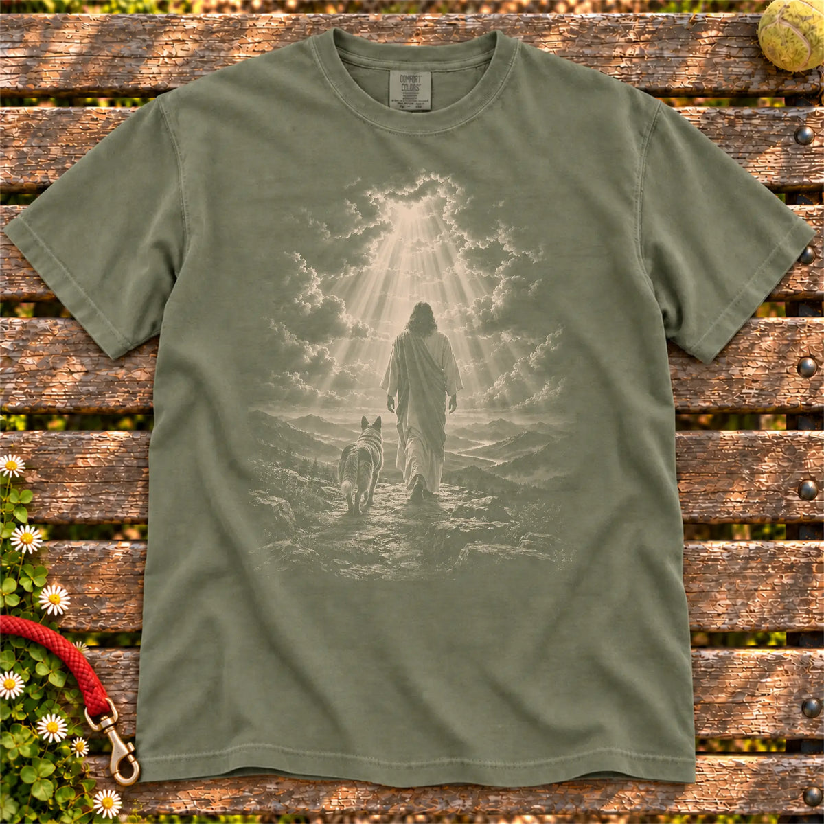 Moss T-shirt showing Jesus walking beside a Blue Heeler beneath rays of light