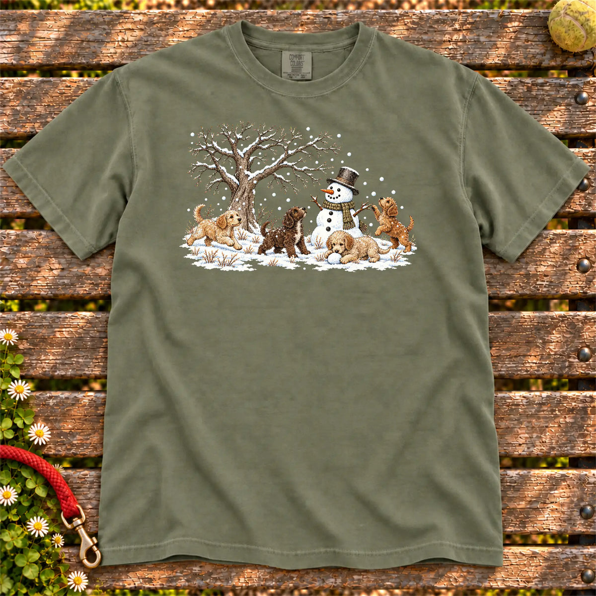 Labradoodle puppies playing in snow with a snowman on a Moss T-shirt
