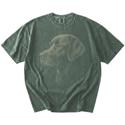 A detailed photographic portrait of a Labrador Retriever on a Moss Comfort Colors® T-shirt