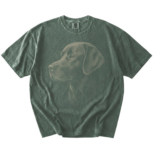 A detailed photographic portrait of a Labrador Retriever on a Moss Comfort Colors® T-shirt