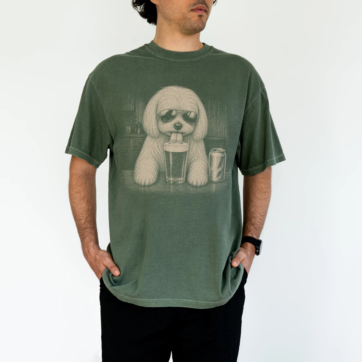 Model wearing a Moss Comfort Colors® t-shirt with Maltese sneaking a drink from a pint