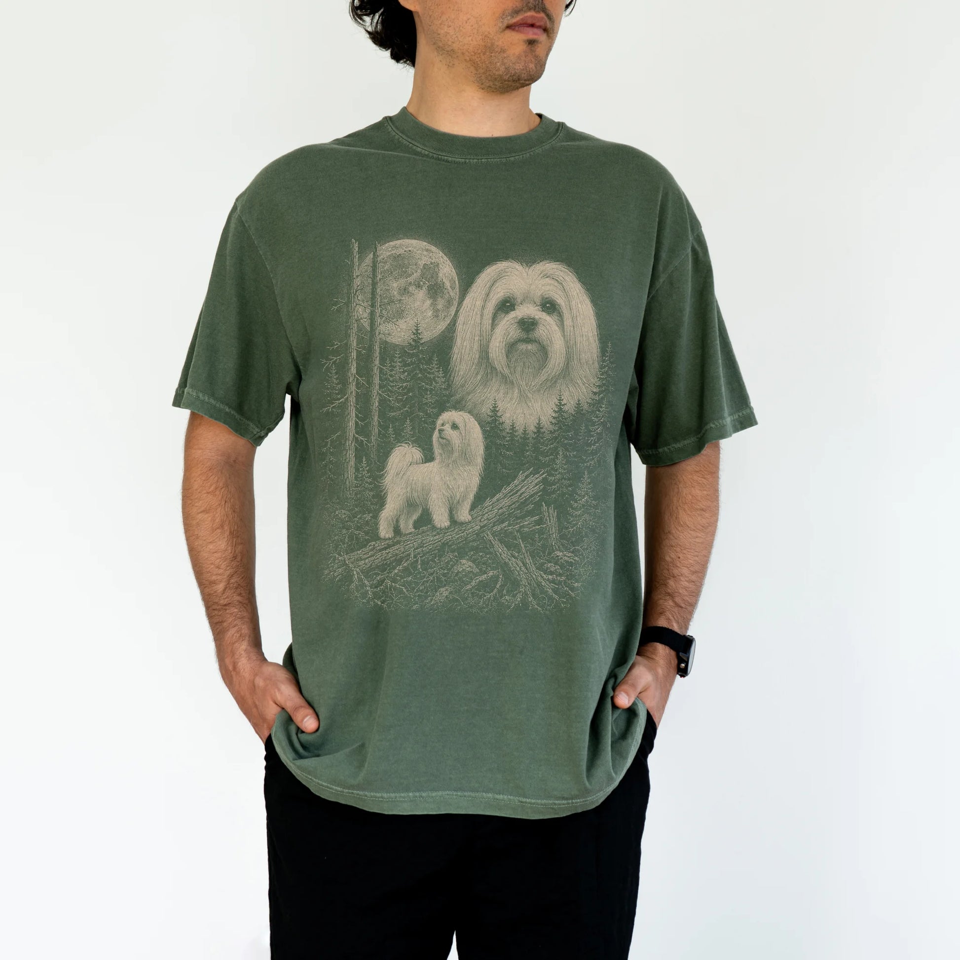 Man wearing a Moss Maltese Moonlit Forest T-Shirt