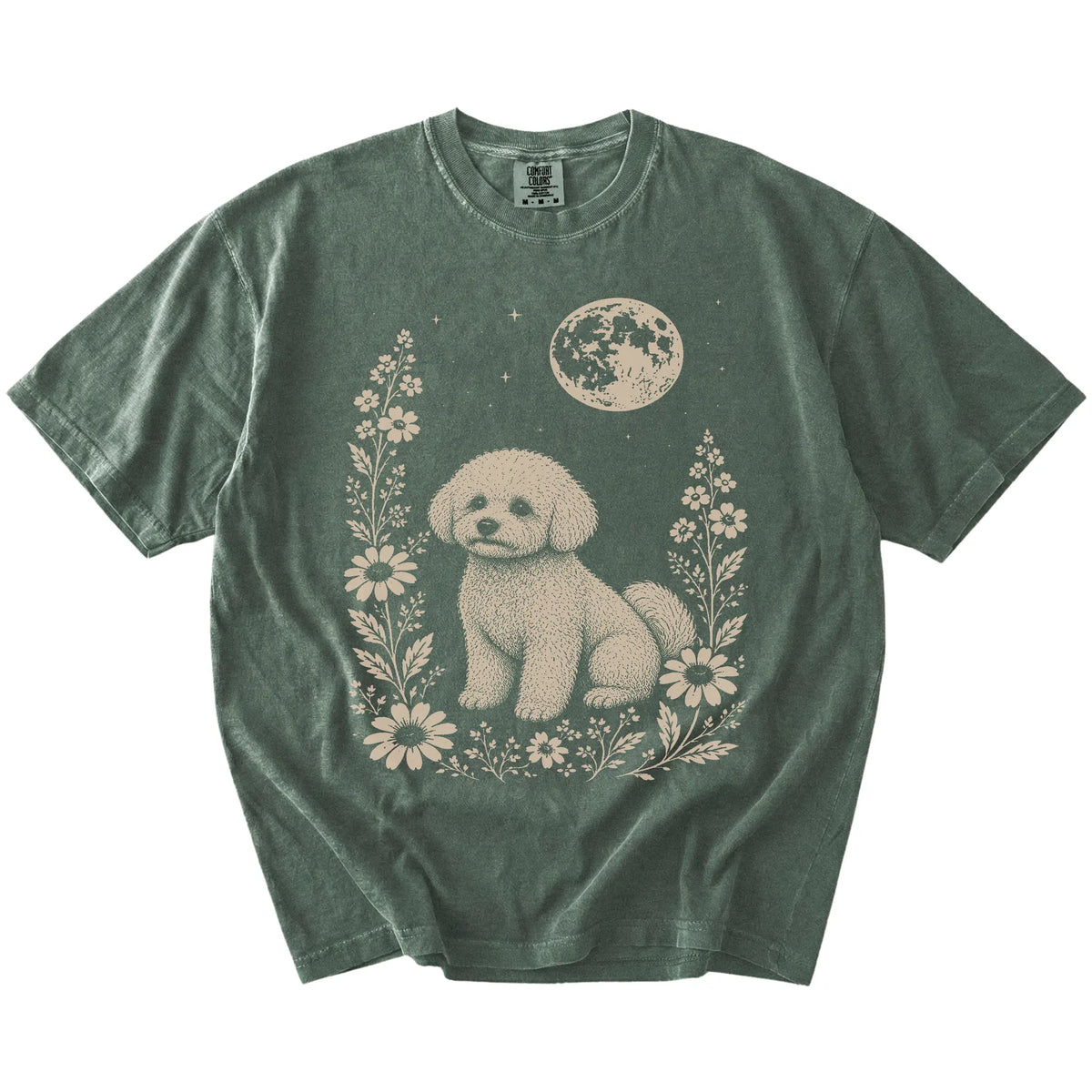 Bichon Frise framed by flowers beneath the moon on a Moss Comfort Colors® T-shirt