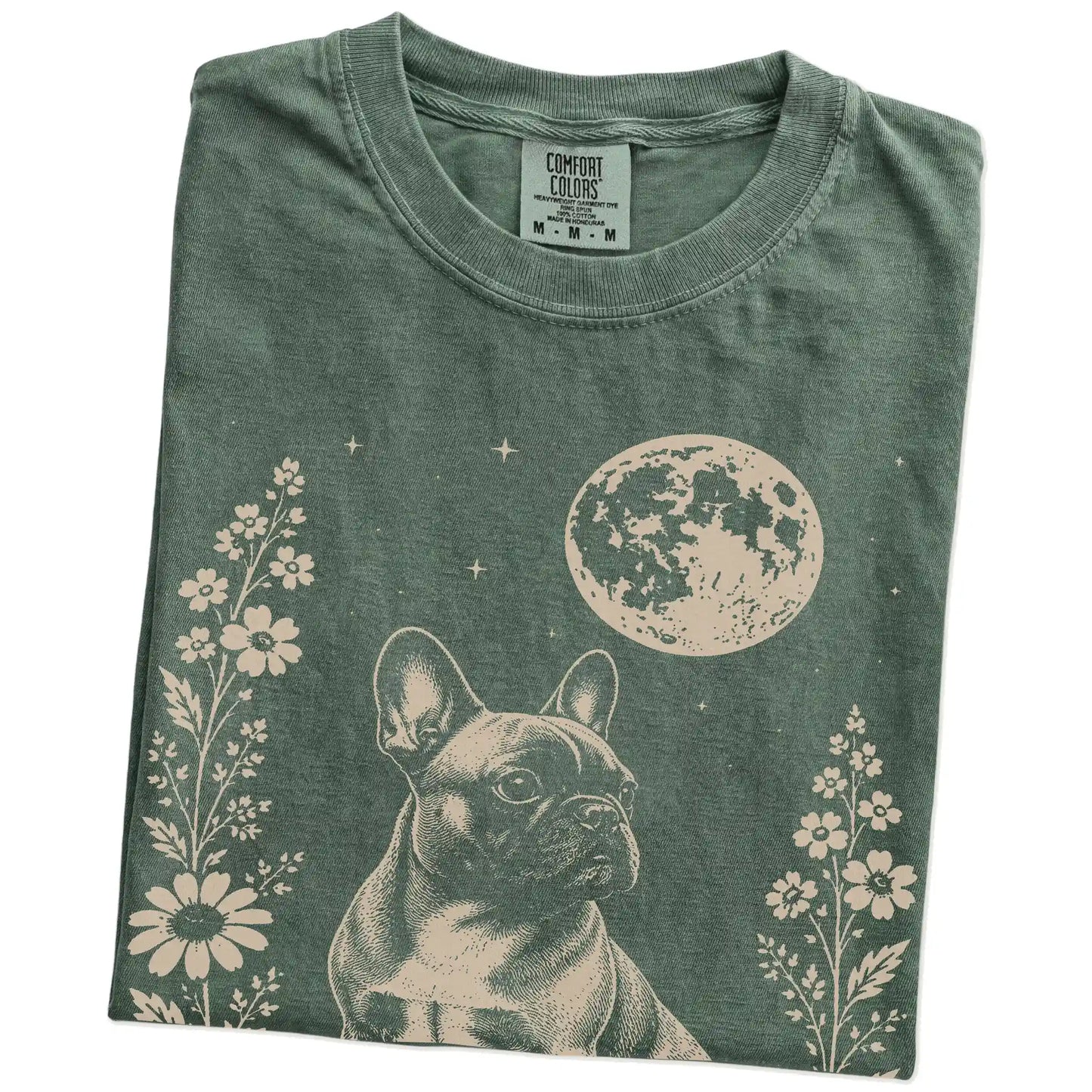 Folded Moss Comfort Colors® T-shirt showing French Bulldog framed by flowers beneath the moon