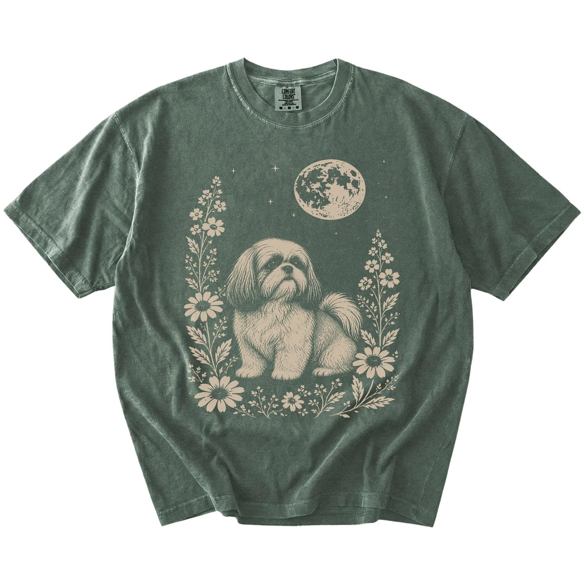 Shih Tzu framed by flowers beneath the moon on a Moss Comfort Colors® T-shirt