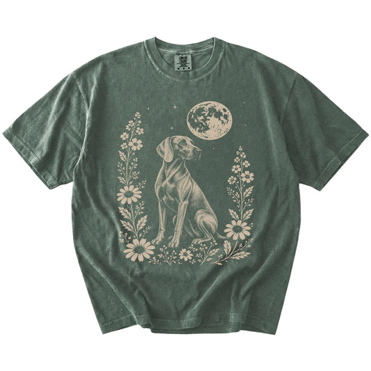 Weimaraner framed by flowers beneath the moon on a Moss Comfort Colors® T-shirt