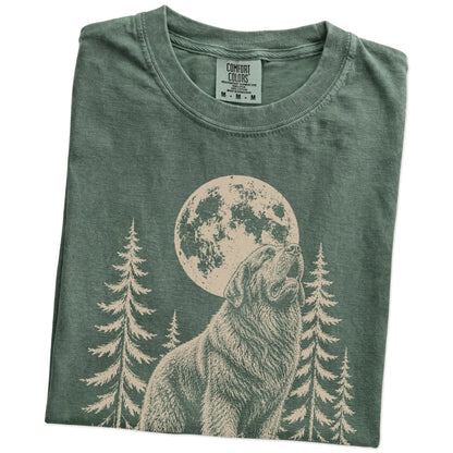 Folded Moss Comfort Colors® T-shirt showing a Newfie howling beneath the moon and pine trees