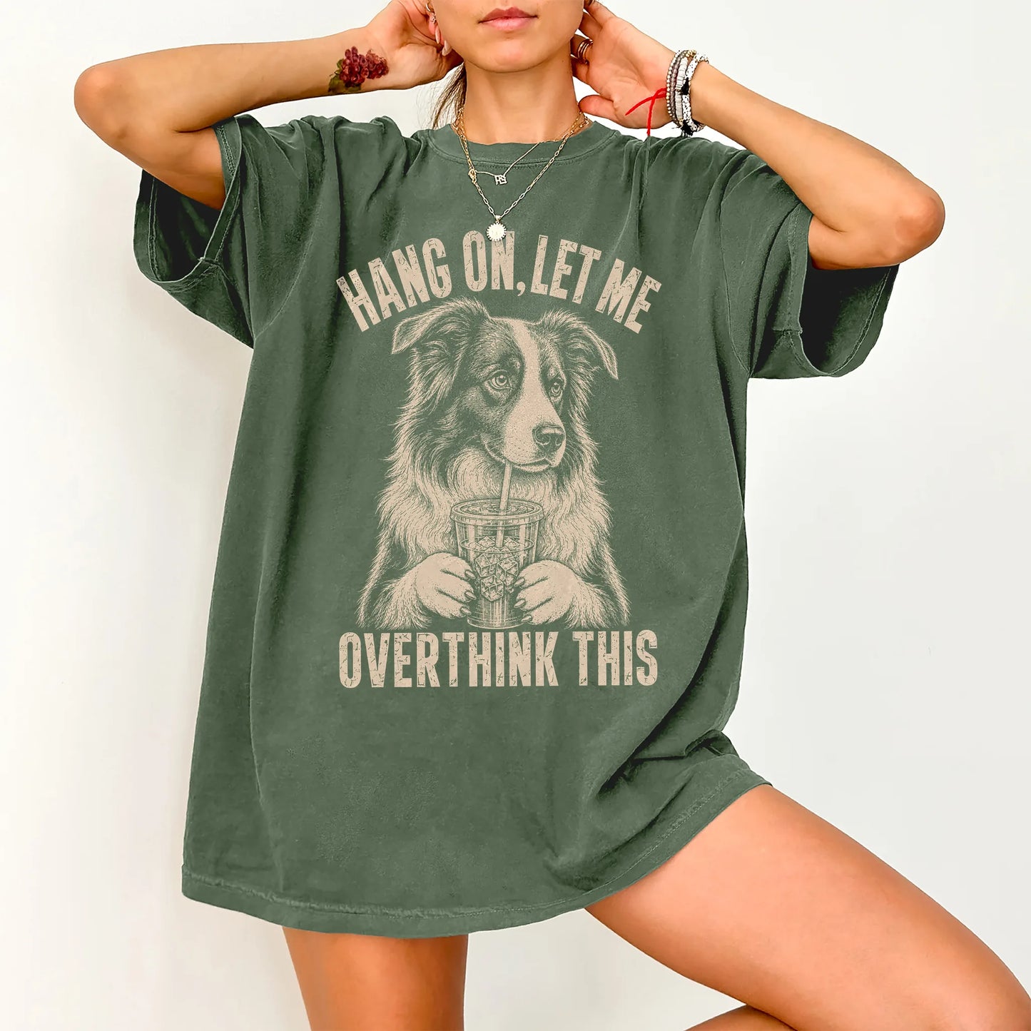 Woman wearing a Moss Overthinking Border Collie T-Shirt
