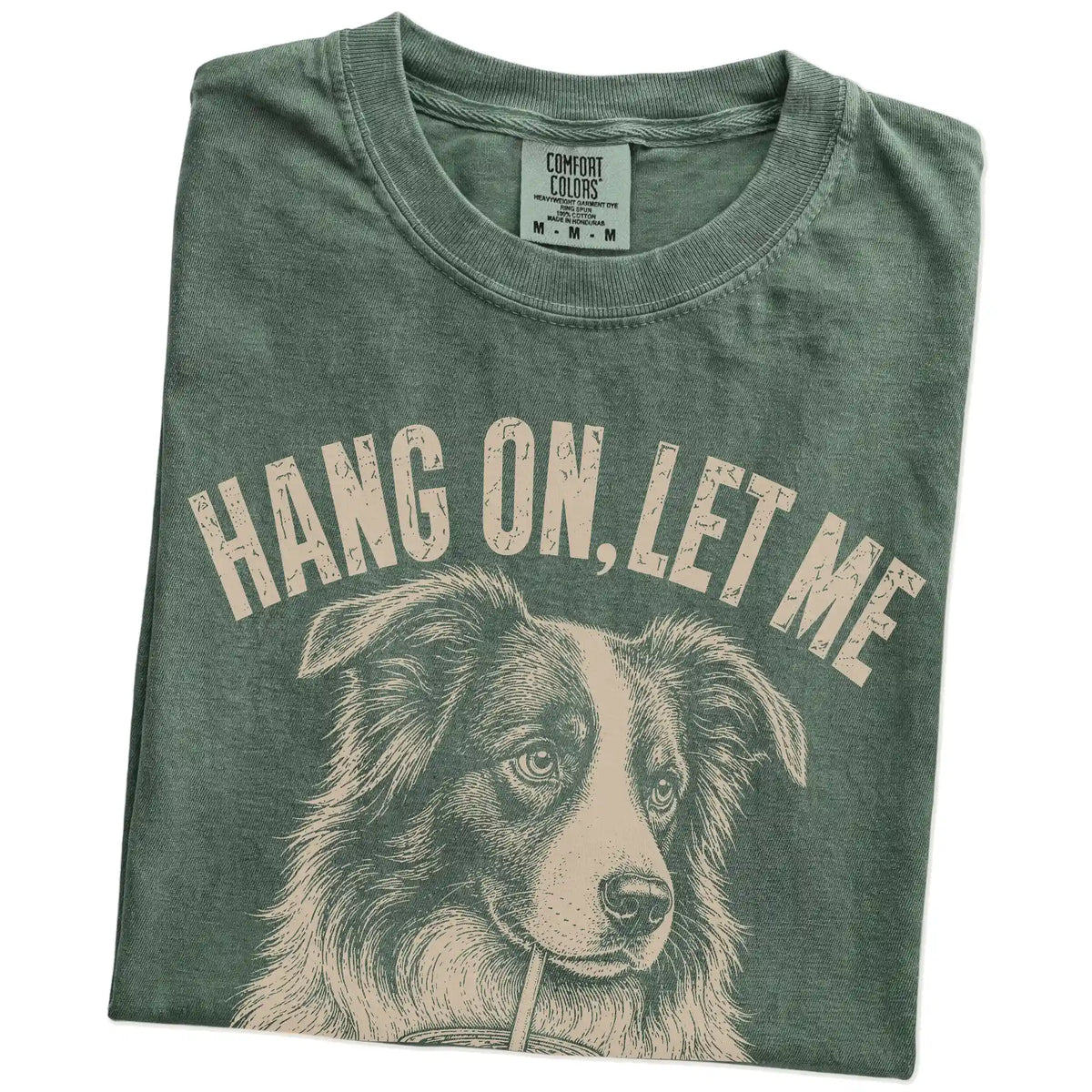 Folded Moss Overthinking Border Collie T-Shirt showing the graphic