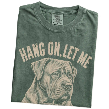 Folded Moss Overthinking Cane Corso T-Shirt showing the graphic