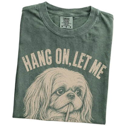Folded Moss Overthinking Shih Tzu T-Shirt showing the graphic