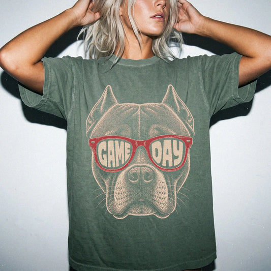 Model wearing a Moss Comfort Colors® T-shirt with pitbull wearing red game day sunglasses