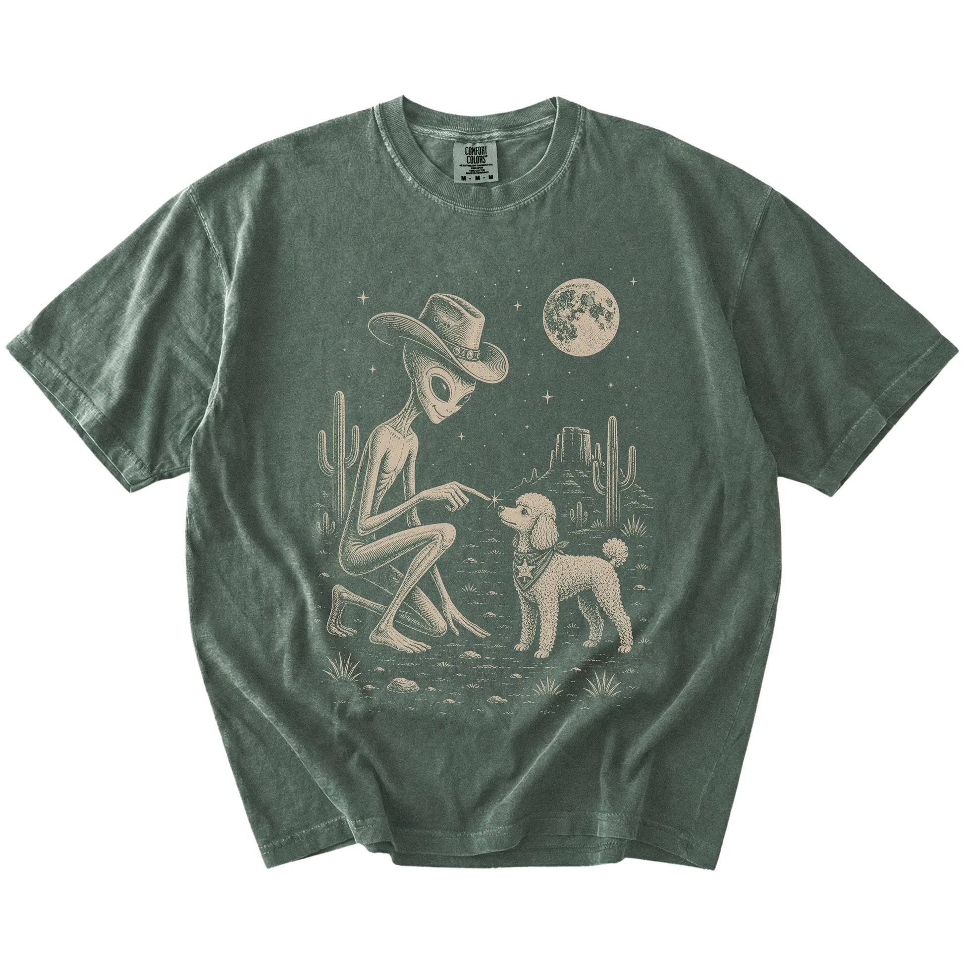 Cowboy alien fist-bumping a Poodle beneath the moon on a Moss Comfort Colors® T-shirt