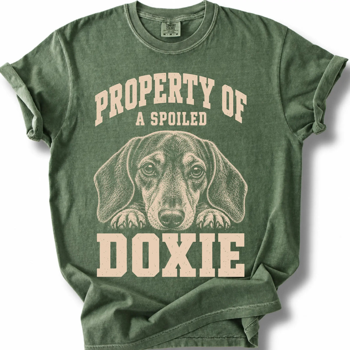 Moss Dachshund T-shirt with a dog portrait and “Property of a Spoiled” lettering.