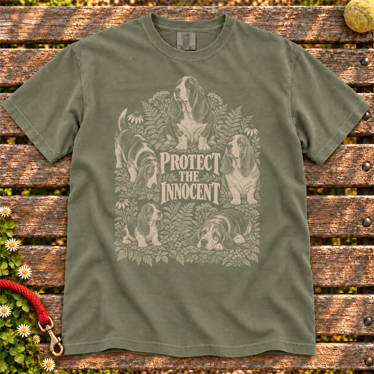 Protect the Innocent Basset Hound design on a Moss T-shirt