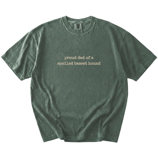 Proud Dad of a Spoiled Basset Hound lettering on a Moss Comfort Colors® T-shirt