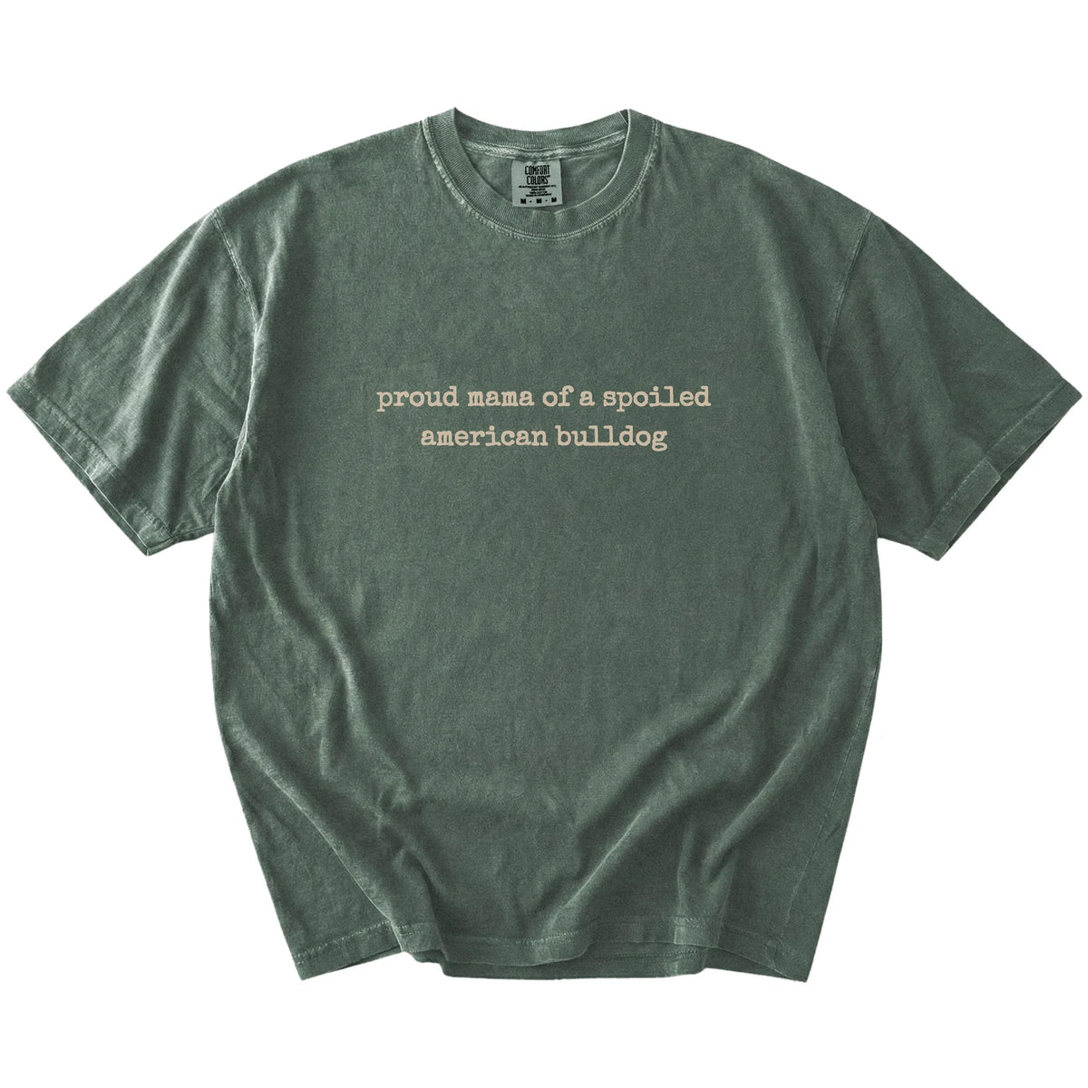 Proud Mama of a Spoiled American Bulldog lettering on a Moss Comfort Colors® T-shirt