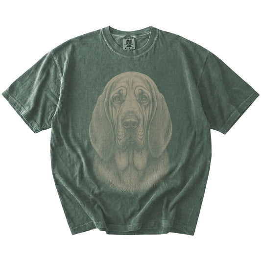 A realistic drawing of a Bloodhound on a Moss Comfort Colors® T-shirt