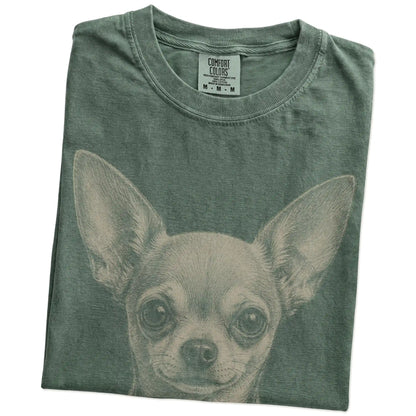 Folded Moss Comfort Colors® T-shirt showing a realistic drawing of a Chihuahua