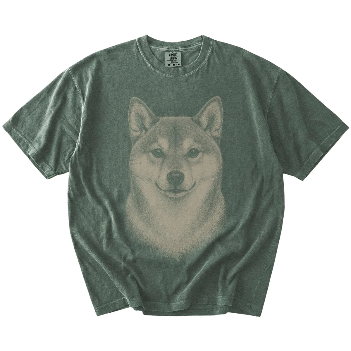 A realistic drawing of a Shiba Inu on a Moss Comfort Colors® T-shirt
