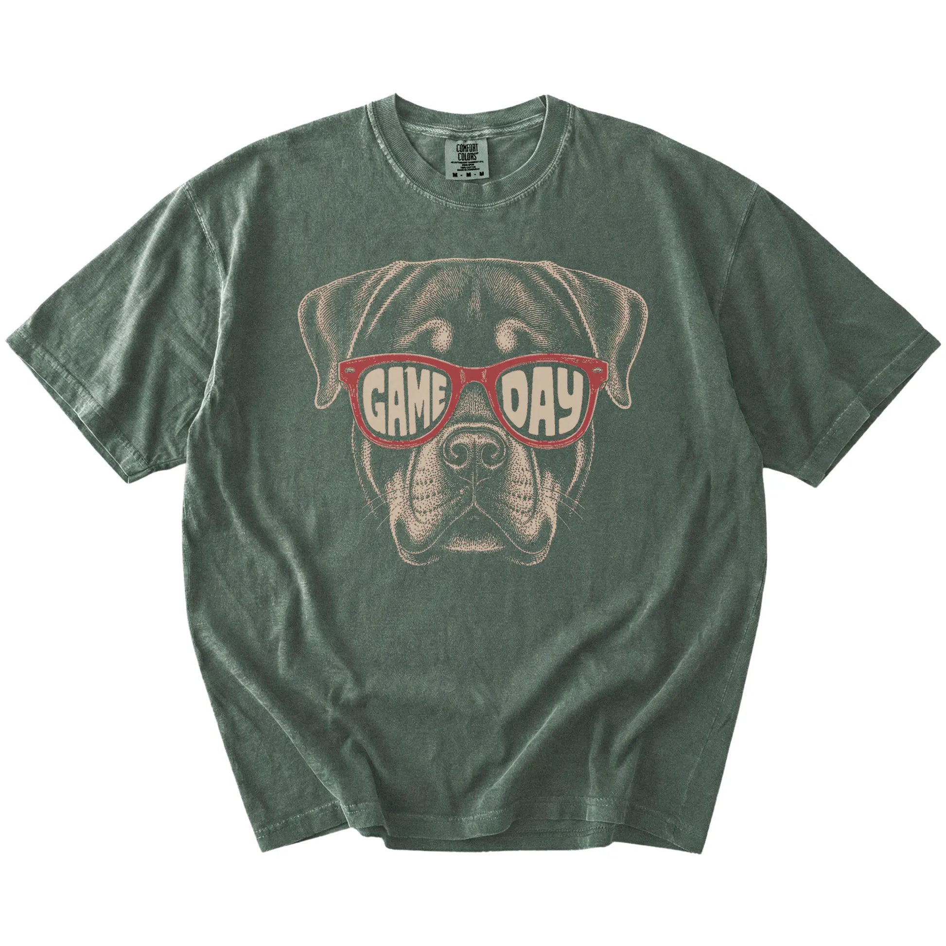 Rottweiler wearing red Game Day sunglasses on a Moss Comfort Colors® T-shirt
