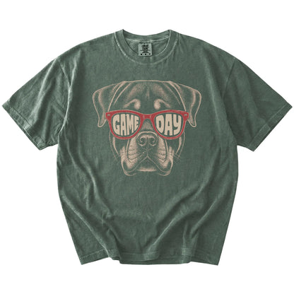 Rottweiler wearing red Game Day sunglasses on a Moss Comfort Colors® T-shirt
