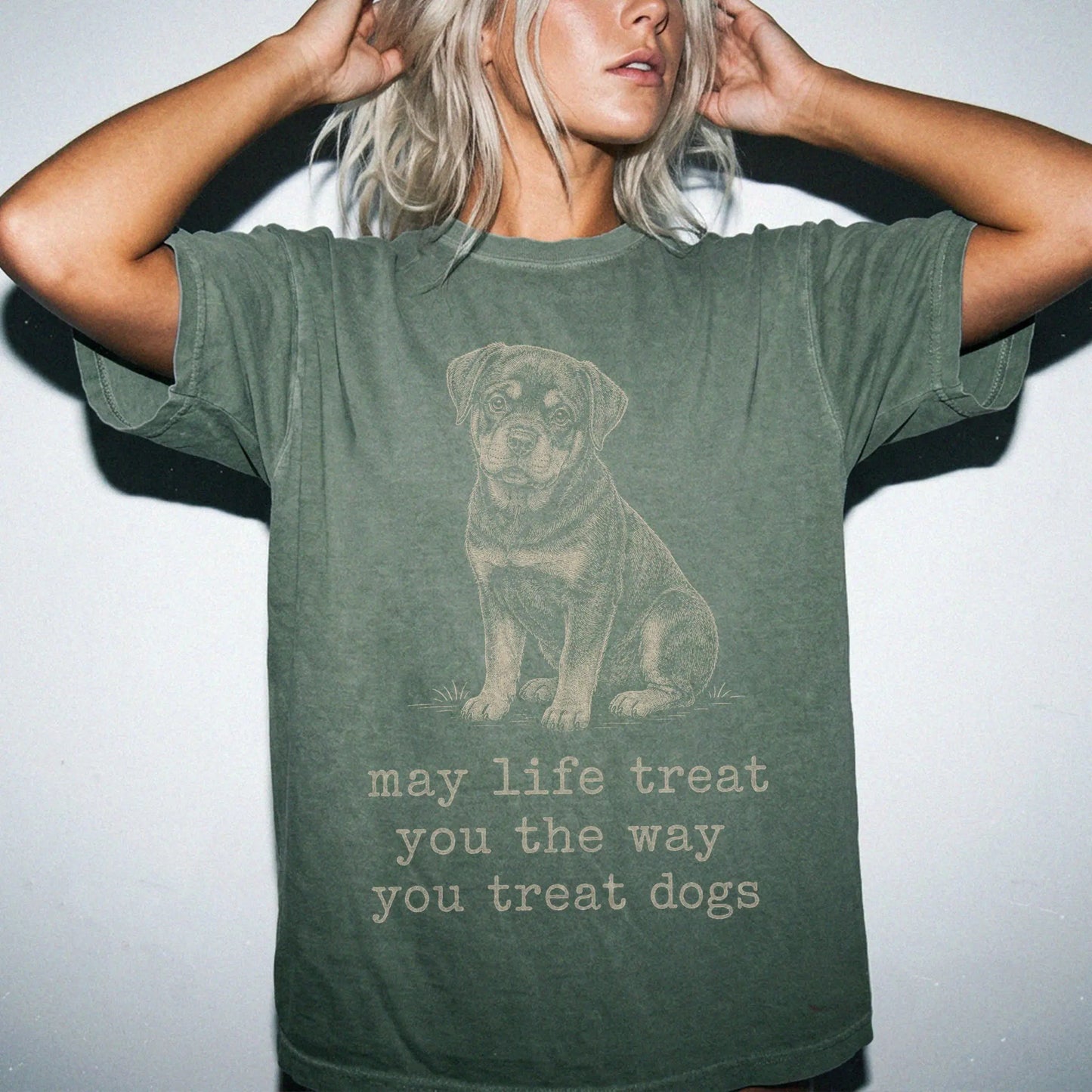 Woman wearing a Moss Rottweiler Karma T-Shirt