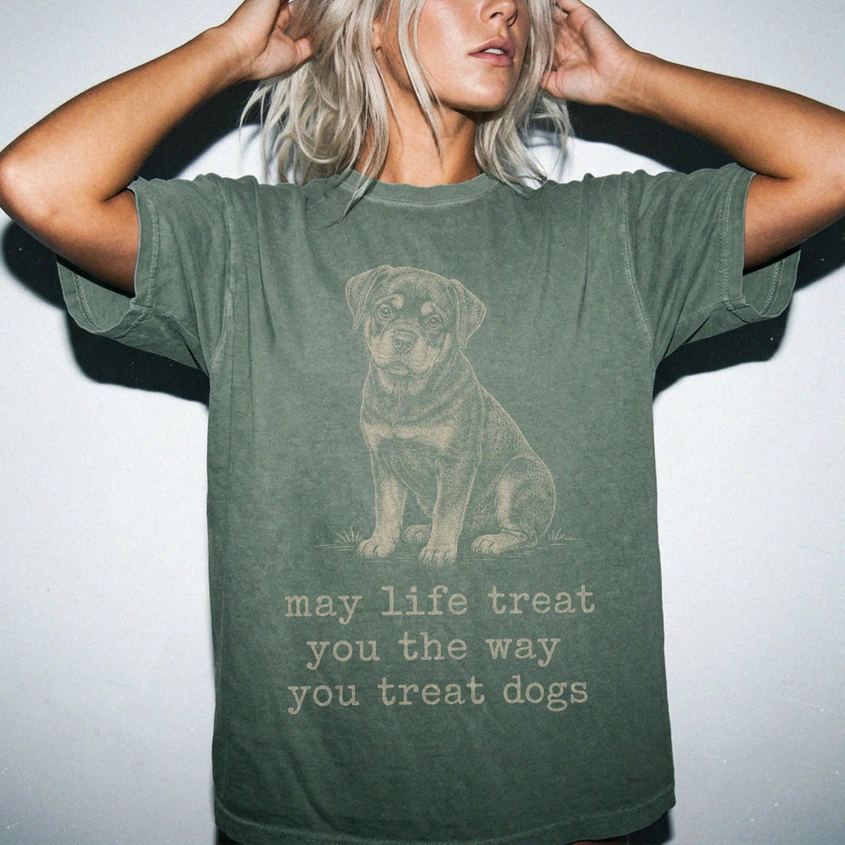 Woman wearing a Moss Rottweiler Karma T-Shirt