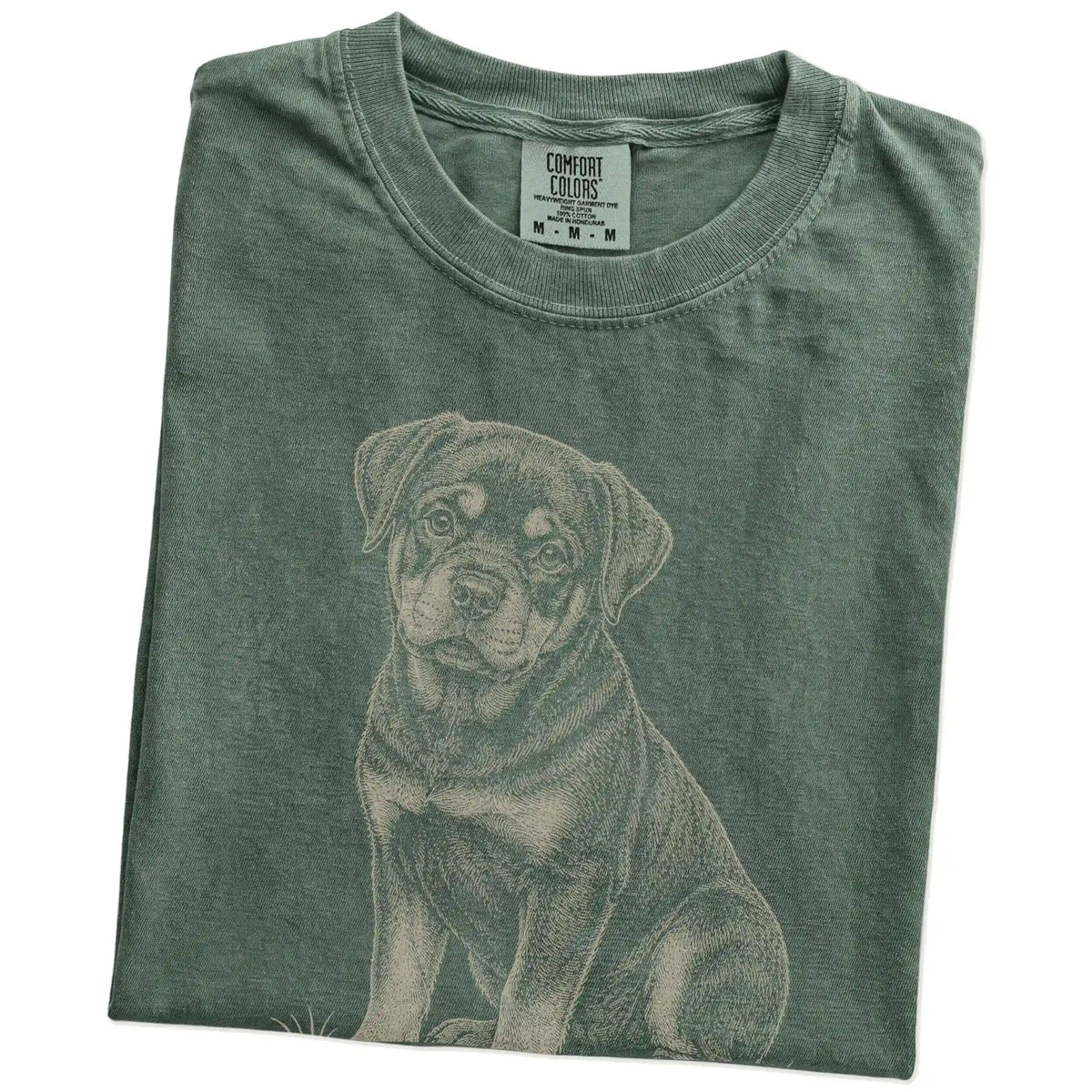 Folded Moss Rottweiler Karma T-Shirt showing the graphic