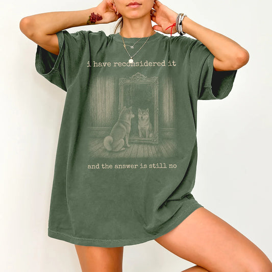 Model wearing a Moss Comfort Colors® T-shirt with “the answer is still no” shiba inu design