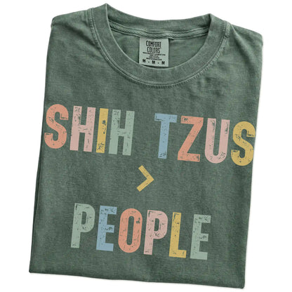 Folded Moss Comfort Colors® T-shirt showing “Shih Tzus > People” text