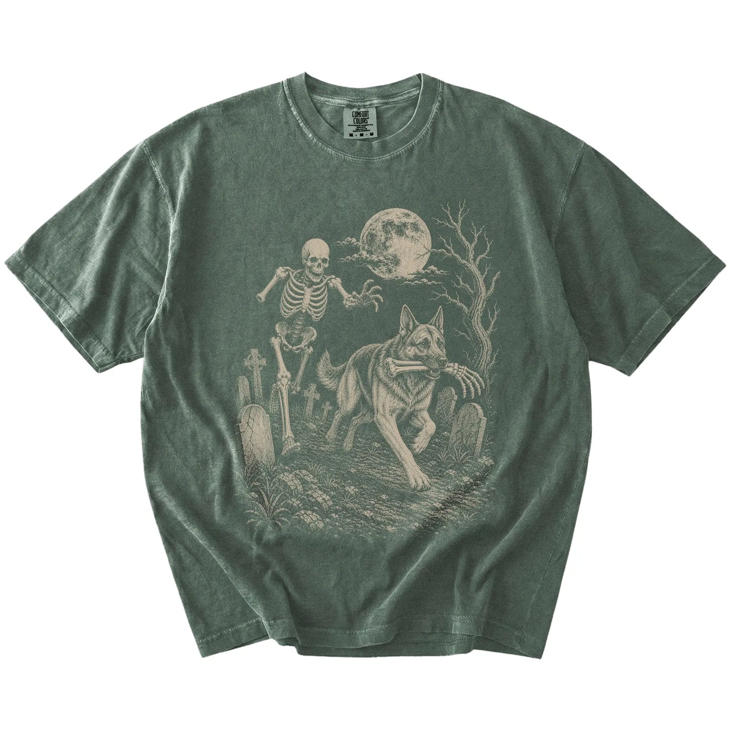 German Shepherd running from a skeleton on a Moss Comfort Colors® T-shirt