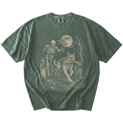 German Shepherd running from a skeleton on a Moss Comfort Colors® T-shirt