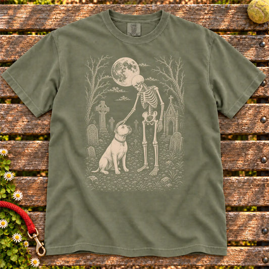 American Bulldog sharing a quiet cemetery moment with a friendly skeleton on a Moss Comfort Colors® T-shirt