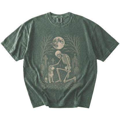 Beagle sharing a quiet cemetery moment with a friendly skeleton on a Moss Comfort Colors® T-shirt