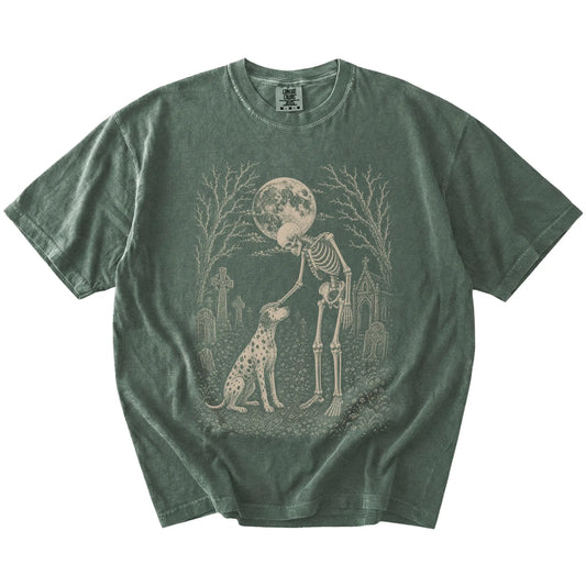 Dalmatian sharing a quiet cemetery moment with a friendly skeleton on a Moss Comfort Colors® T-shirt