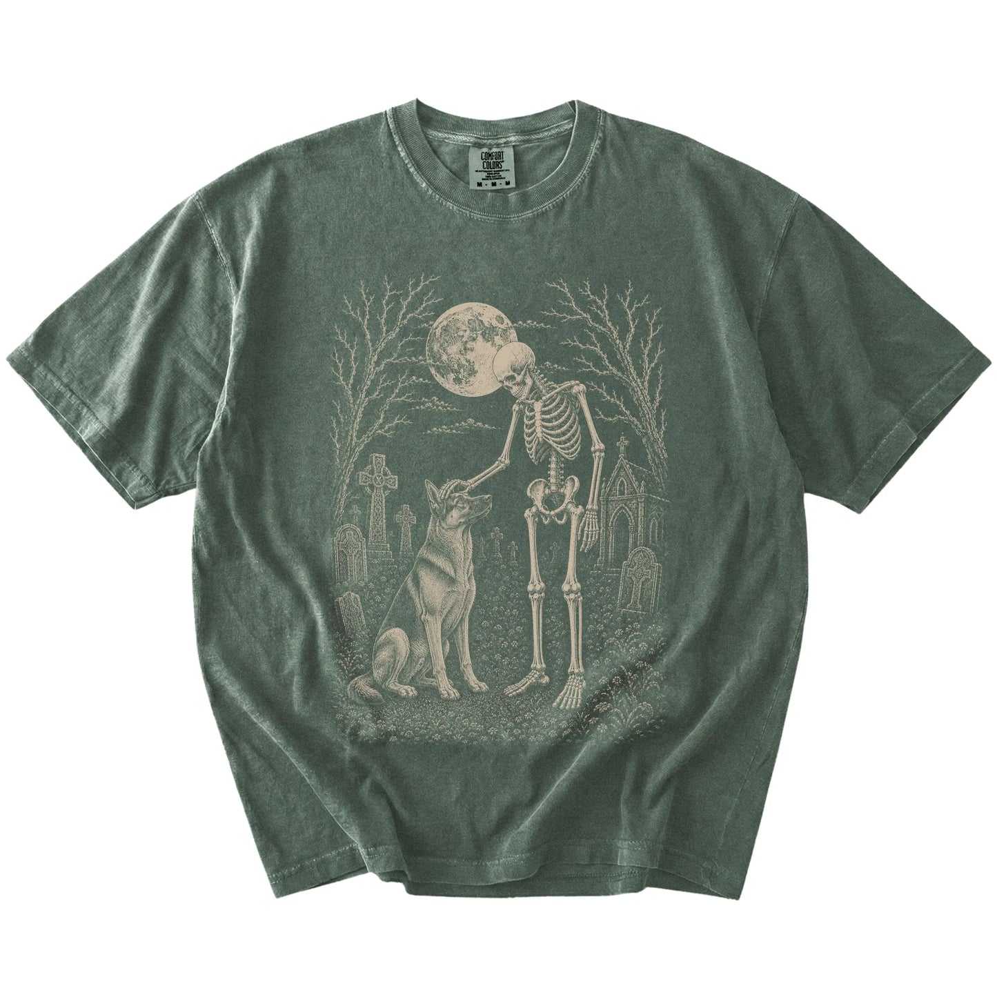 German Shepherd sharing a quiet cemetery moment with a friendly skeleton on a Moss Comfort Colors® T-shirt